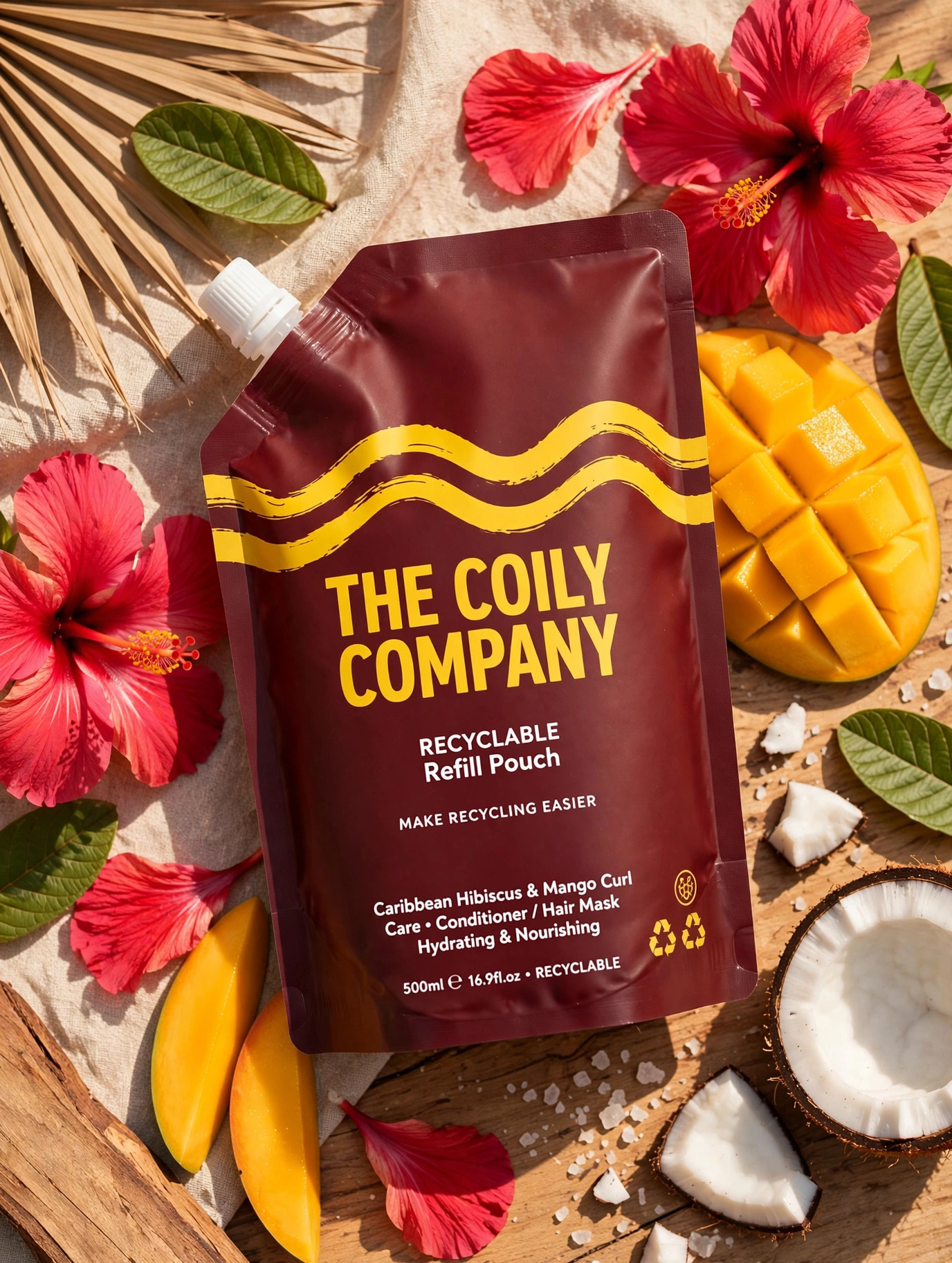 The Coiling Cream refill pouch with mango, hibiscus, coconut and guava